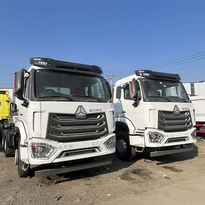 Segmento camion pesante 6X4 60 tonnellate Rhd Sinotruk HOWO testa trattore camion finestra manuale